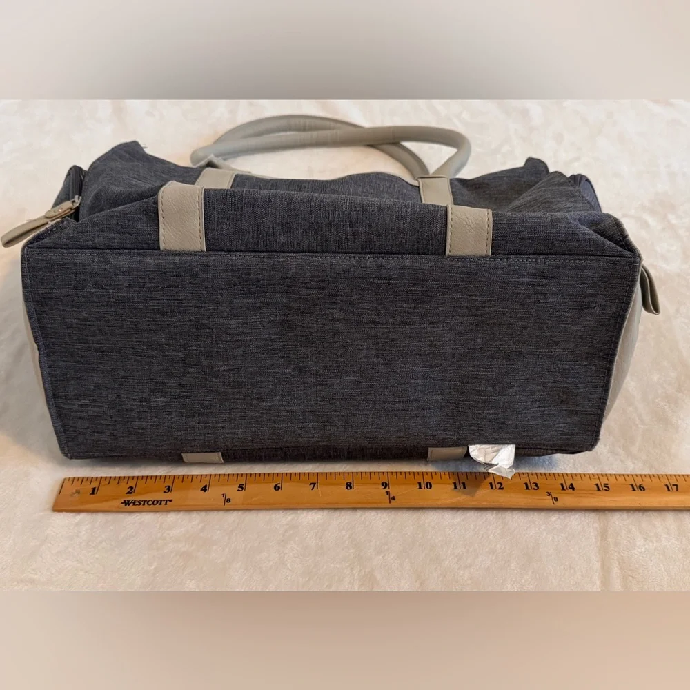Bananafish Diaper Bag.  New Condition/ Never used.  Light navy and taupe/tan.